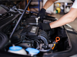 mechanic-looking-under-the-bonnet